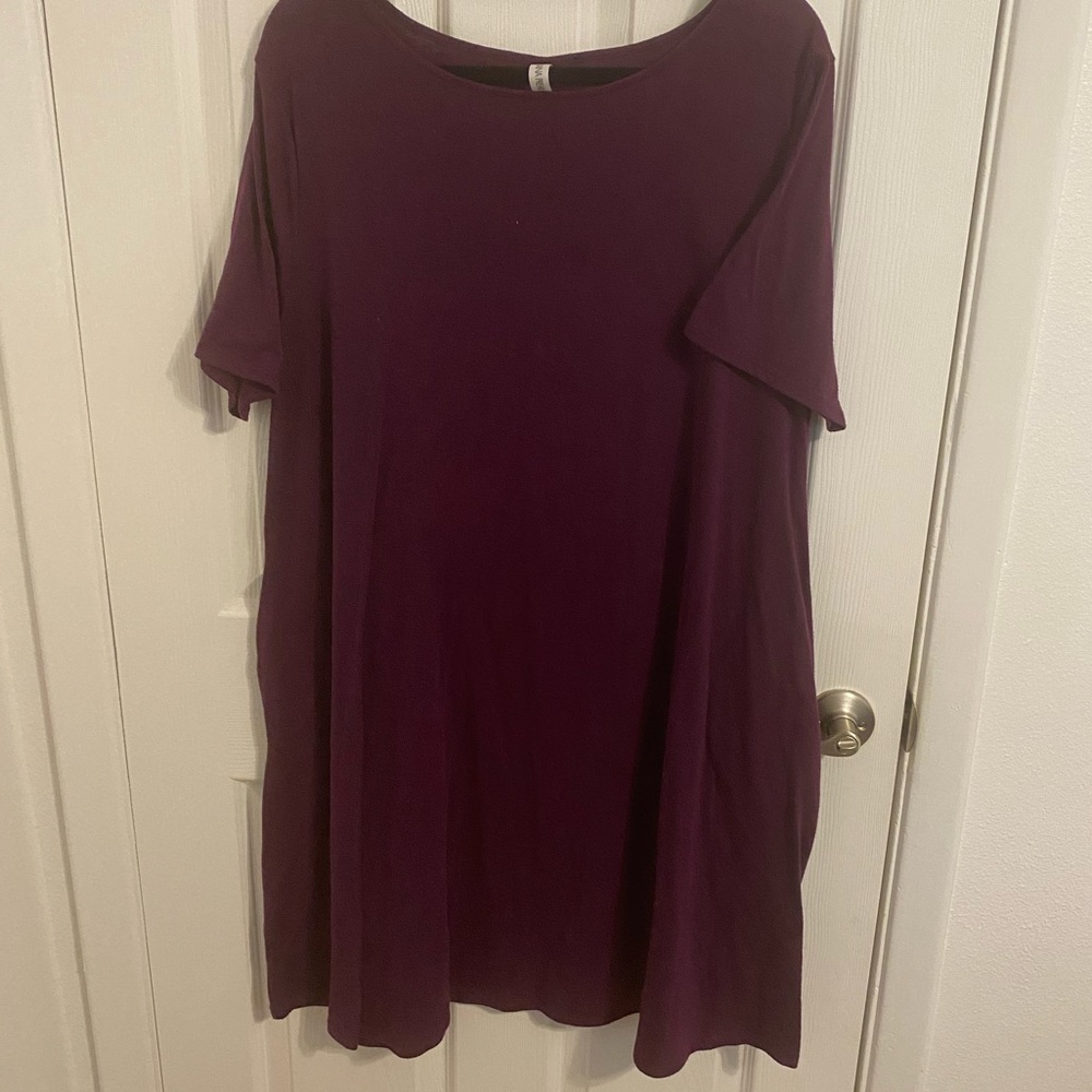 Purple knee length dress with pockets